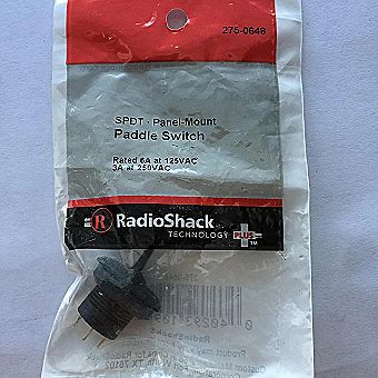 SPDT Panel-Mount Paddle Switch. Rated 6A at 125VAC SPDT Panel-Mount Paddle Switch. Rated 6A at 125VAC